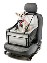 Car Seat Dog Cradle - This dog cradle folds flat so that you can keep it in the car at all times. It takes minutes to attach to any seat and features an integral safety strap that will clip onto any dog harness to keep your dog safe and secure throughout the journey. The cradle features support bars around the three side...
