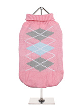 Baby Pink / Grey Argyle Sweater - Knitted Baby Pink / Grey Argyle Sweater with a pink and grey diamond pattern. The Argyle pattern has seen a resurgence in popularity in the last few years due to its adoption by Stuart Stockdale in collections produced by luxury clothing manufacturer, Pringle of Scotland. The rich Scottish heritage...